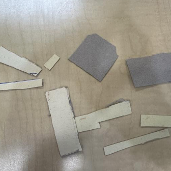 Cut up pieces of cardboard.