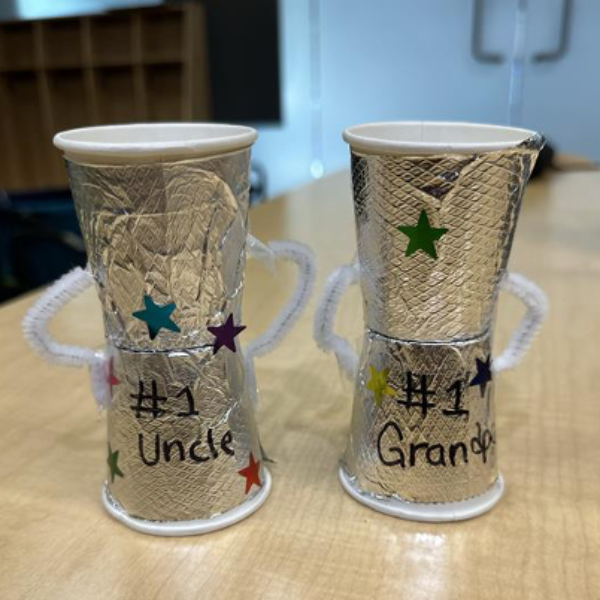 Two Father's Day trophy crafts.