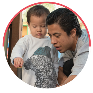 man and son exploring exhibits