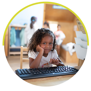 little girl at keyboard at SDCDM