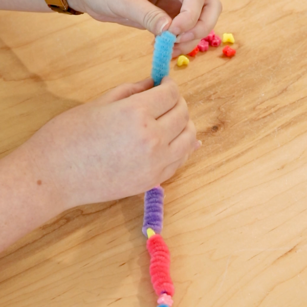 Strung pipe cleaner beads on pipe cleaner.