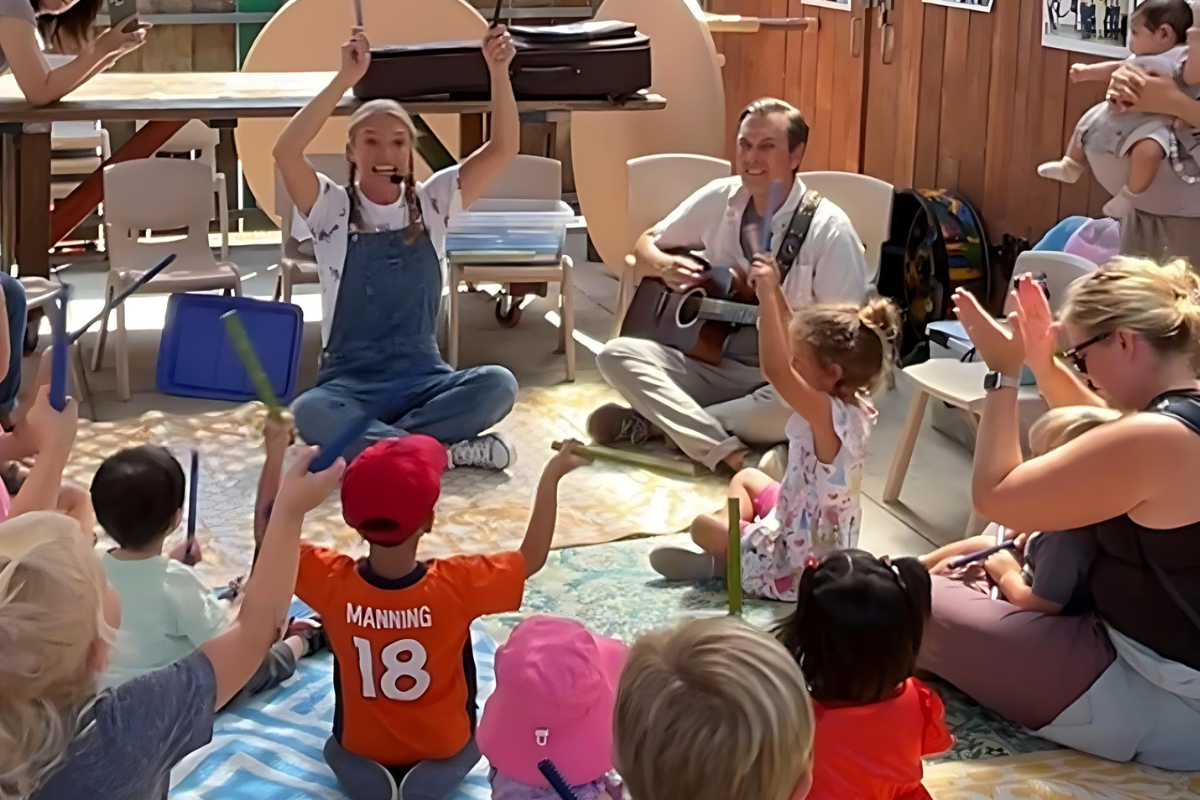 Kids participating in a music and movement pop-up.