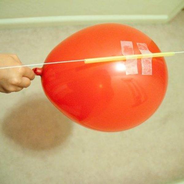 Balloon rocket on a string.