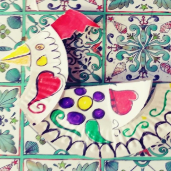 The decorated paper plate rooster fully put together.