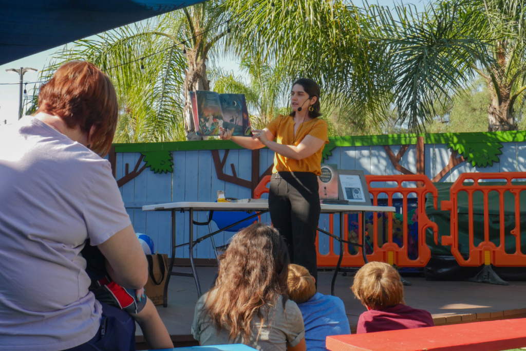 Kate Allen Fox reading to families.